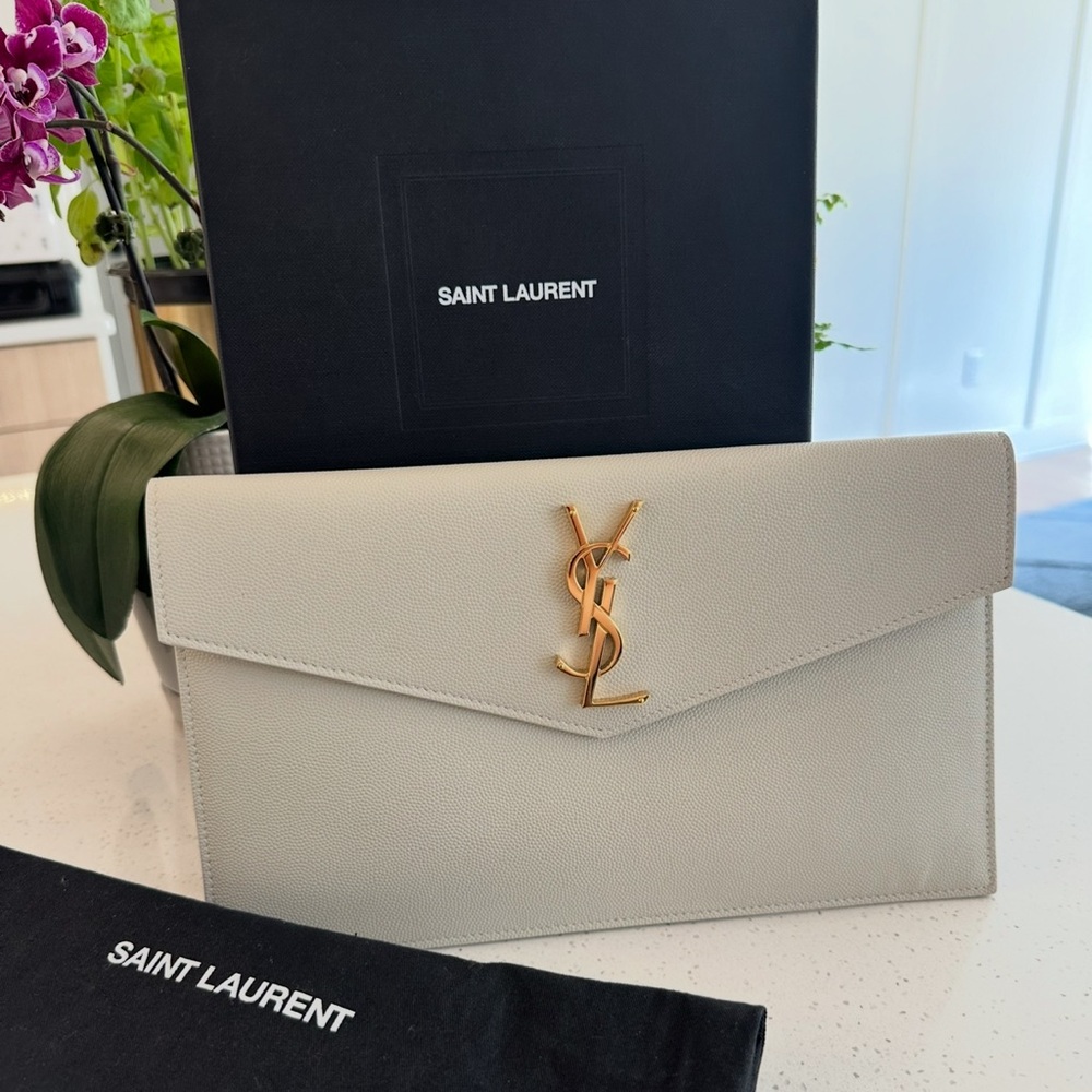 Saint Laurent Ivory Clutch with Gold Logo